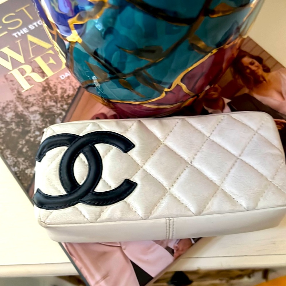 - Chanel Cambon Wristlet with Chanel charm tab chain comes with Chanel dust bag